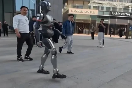 Inspired by "Iron Man," the PM01, launched by the Chinese company EngineAI Robotics, uses an AI neural network and impressed viewers in a video with its human-like walk.